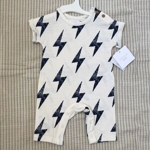 Grayson Mini Cream Baby Romper with Navy Lightning Bolts